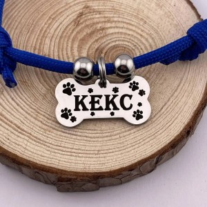 Адресник у формі кісточки з ім’ям собаки